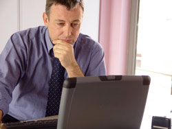 Image of person looking at computer screen