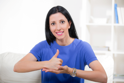 woman using sign language